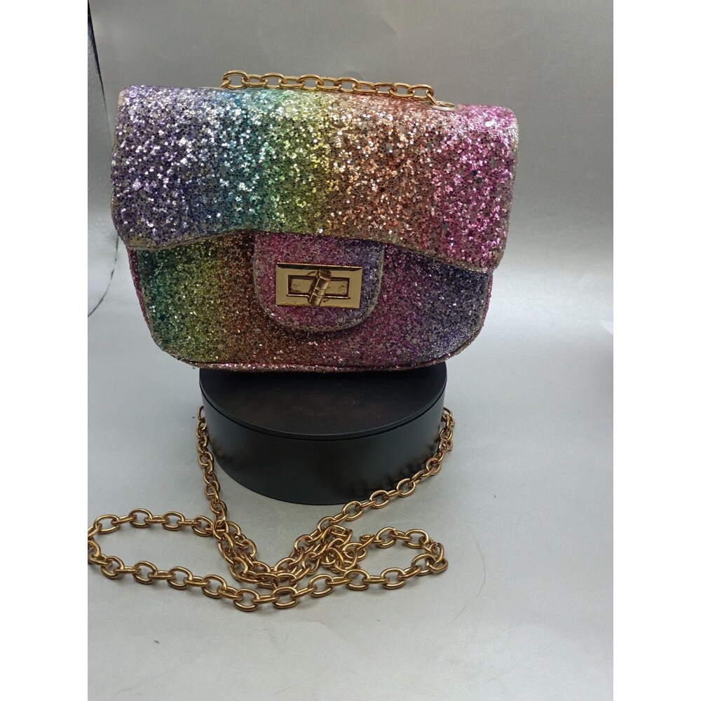 GB Girls rainbow glitter crossbody handbag featuring a gold chain strap and...